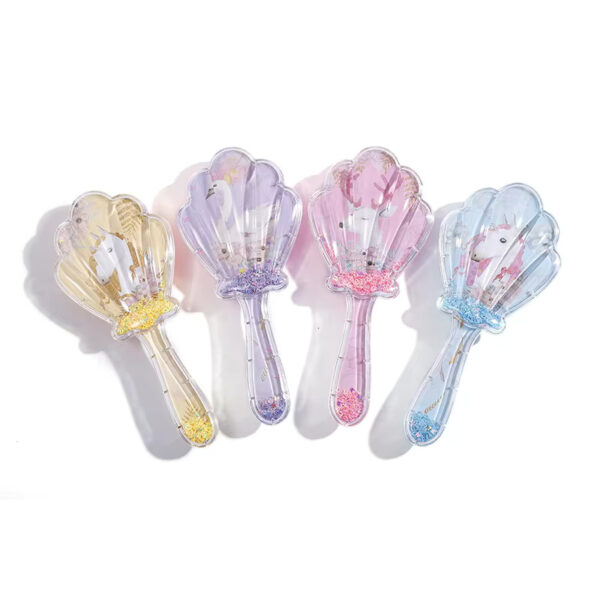 Shell shaped hair comb