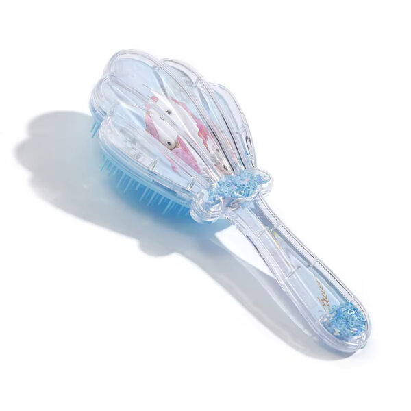 Shell shaped hair comb