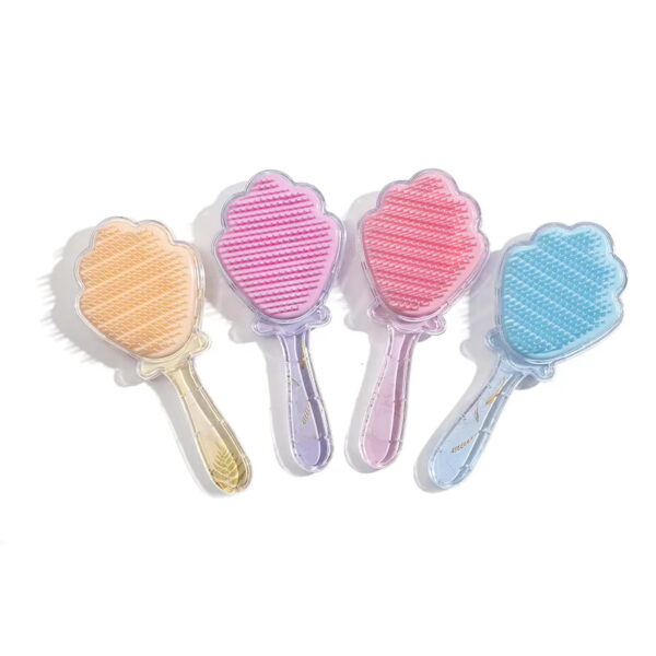 Shell shaped hair comb